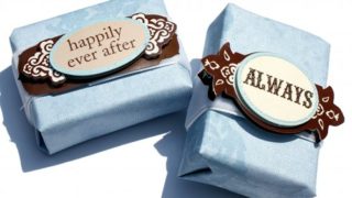 handmade soap wedding favors decorated in blue scrapbook paper, ribbon and decorate 3-d wedding stickers