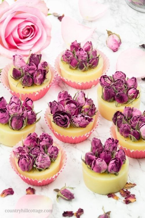 Essential Oil Rose Bath Truffles Recipe for the best Mother's Day gifts. Help Mom take a time out for self care with these skin softening DIY rose bath truffles from Country Hill Cottage. Made with six natural ingredients, these beautiful bath treats infuse bath water with nourishing oils and butters to moisturize Mom's beautifully maturing skin!
