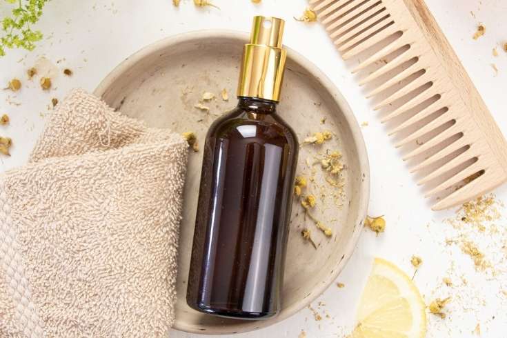 Lighten hair naturally with an easy, herbal DIY hair lightener spray. This homemade hair lightener sets soft highlights & lends a healthy, sun-kissed glow. Want to learn how to lighten hair naturally? Discover different ways for to naturally lighten your hair with everyday ingredients, such as honey, chamomile, lemon juice, and salt. You will also learn how to create a DIY hair lightener spray, that sets soft highlights and gives your mane a healthy, sun-kissed glow.